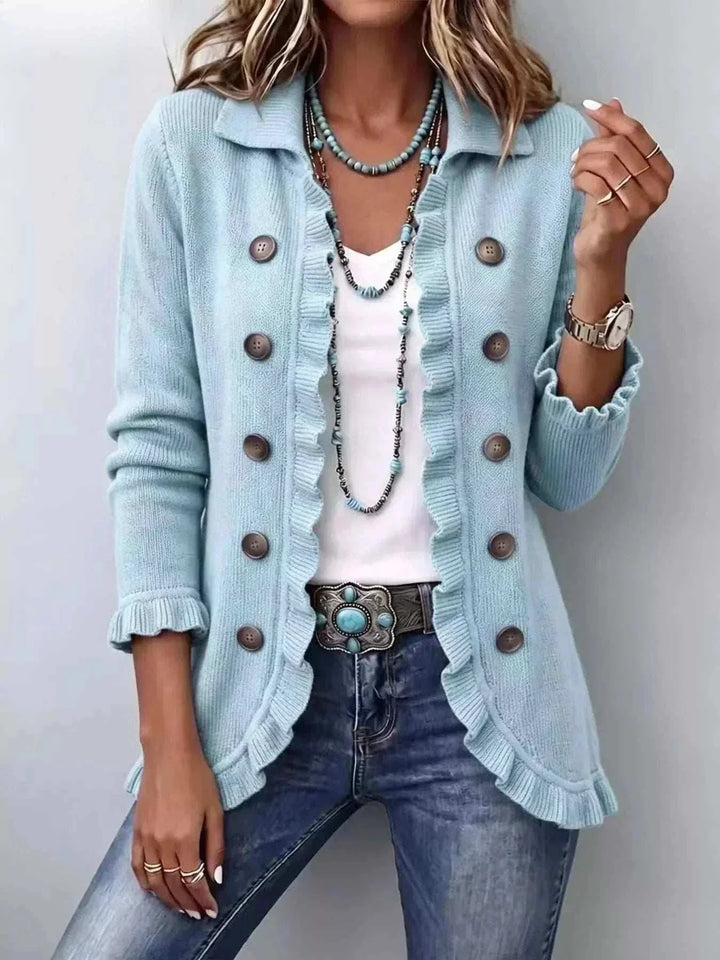 Women’s Plus Size Ruffled Cardigan in pale blue knit with ruffled edges, a collared neckline and brown buttons