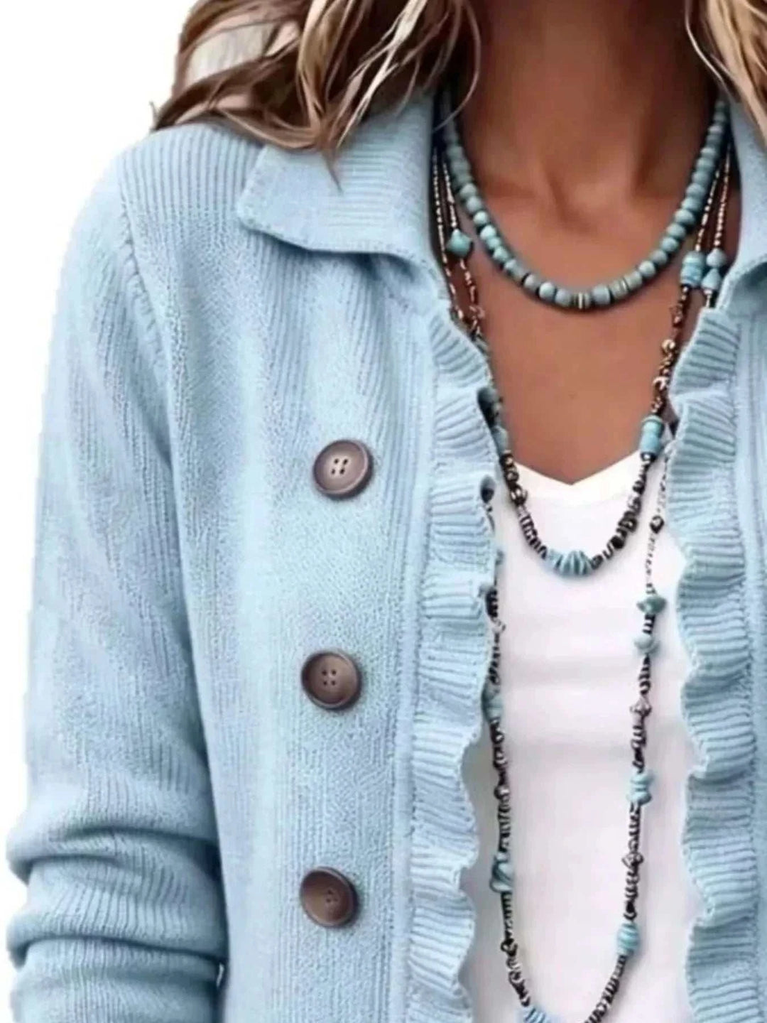 Women’s Plus Size Ruffled Cardigan in pale blue ribbed knit with brown buttons, ruffled front trim and wide collar