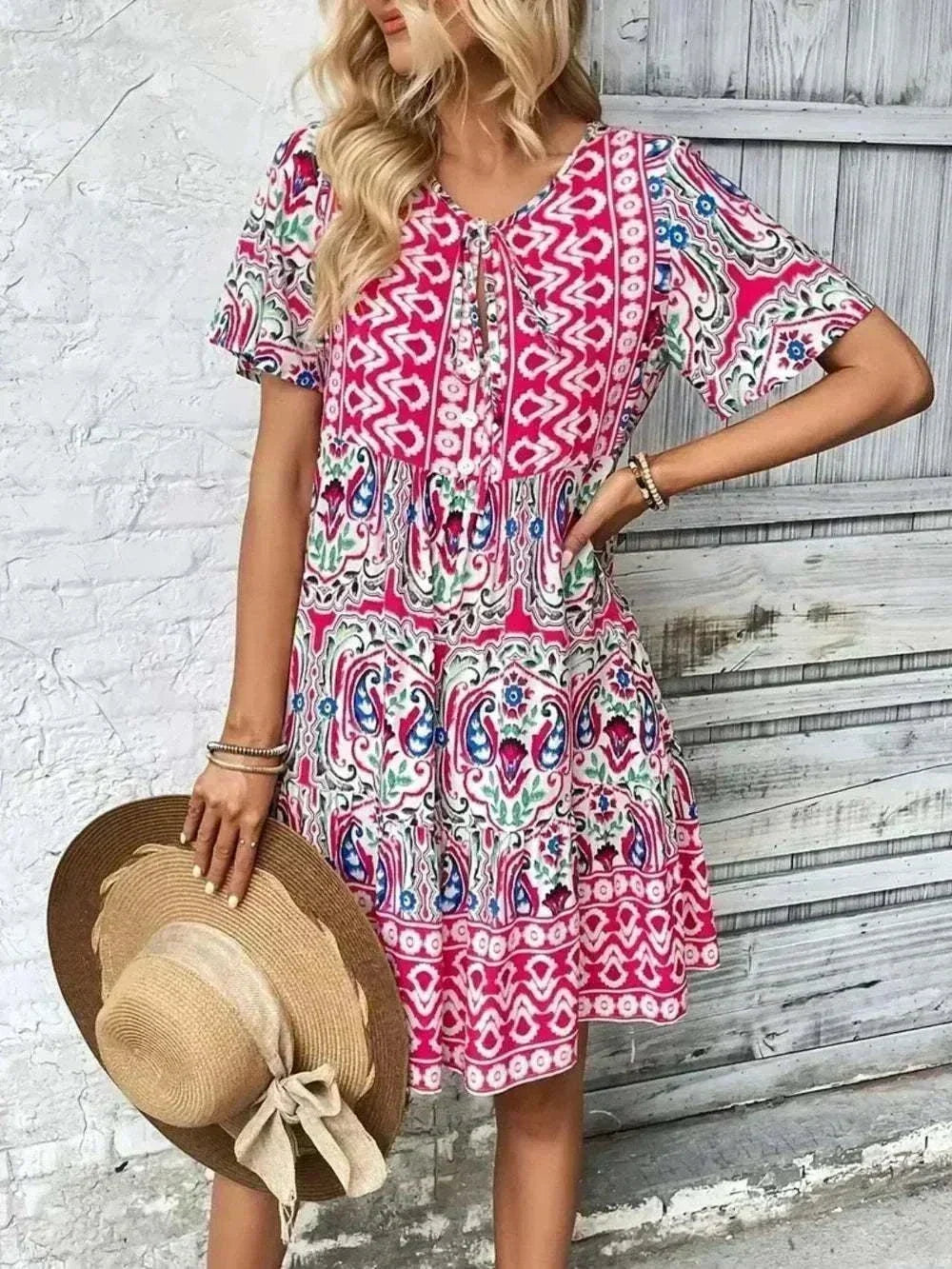 Women's Printed Tie Neck Short Sleeve Dress in pink, white, and teal with an ornate paisley print and flutter sleeves