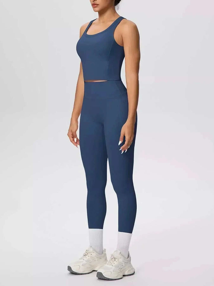 Women’s Tank and Leggings Set in solid navy blue stretch fabric, with a cropped scoop-neck tank and high-waisted leggings.