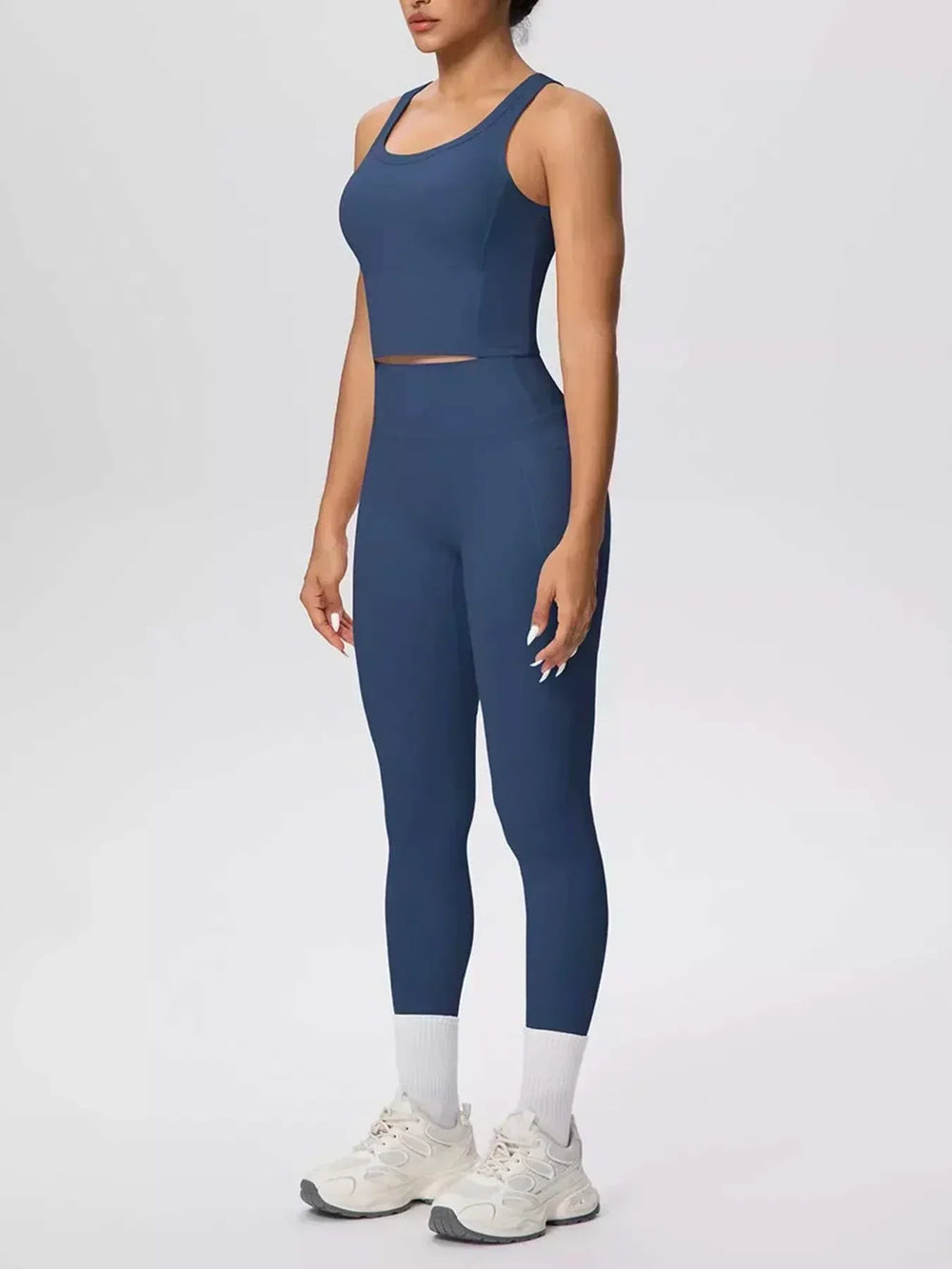 Women’s Tank and Leggings Set in solid navy stretch fabric, featuring a scoop-neck cropped tank and high-waisted leggings