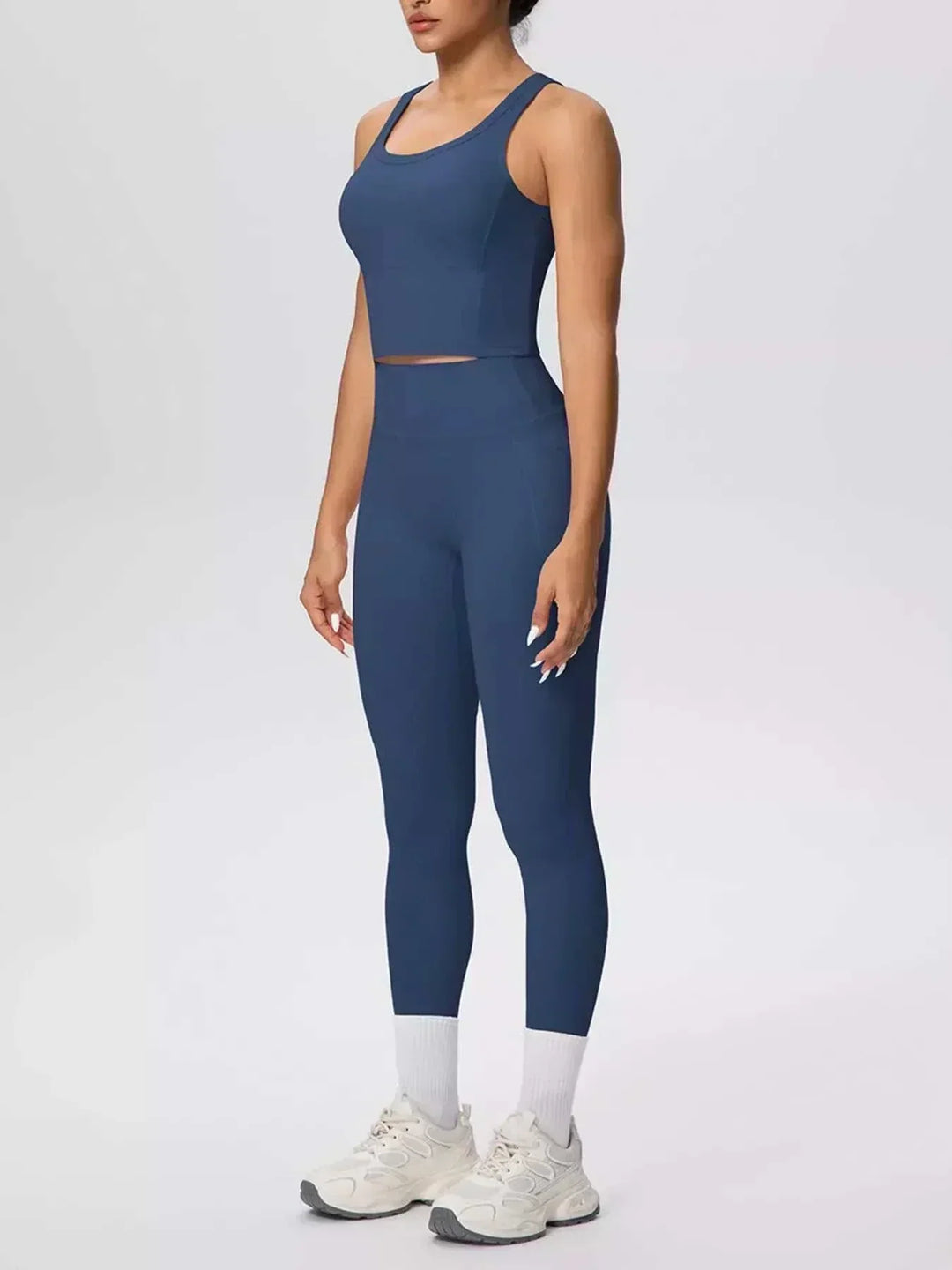Women’s Tank and Leggings Set in solid navy stretch fabric, featuring a scoop-neck cropped tank and high-waisted leggings
