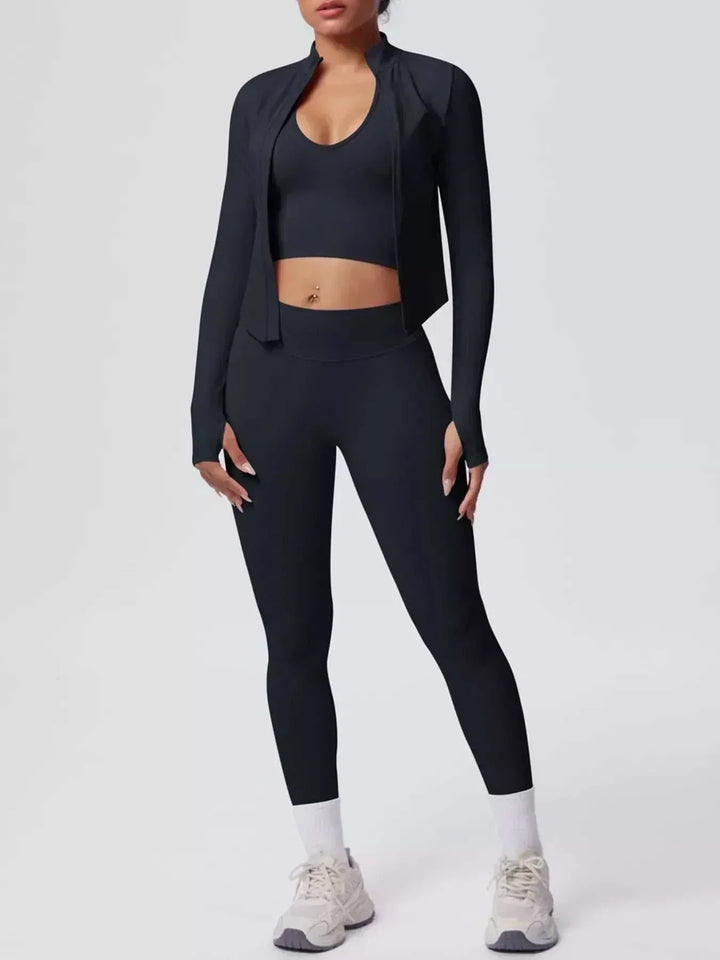Women’s Three-Piece Activewear Set in black stretchy fabric, featuring a cropped tank, zip-up jacket and high-waisted leggings