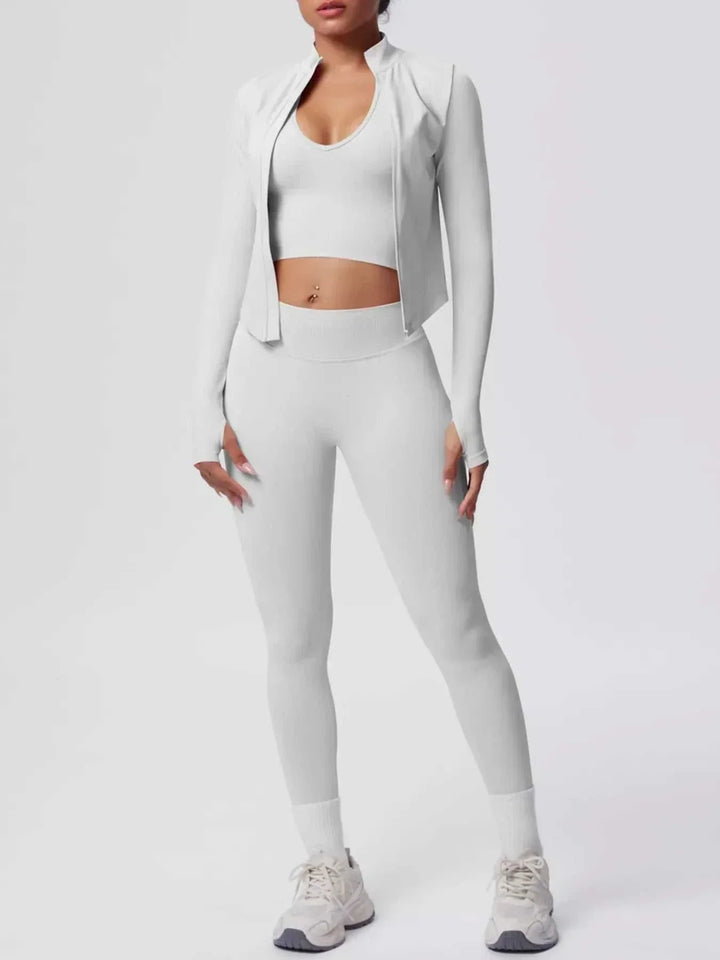 Women’s Three-Piece Activewear Set in white stretch fabric, with a cropped tank, zip-up jacket and fitted leggings