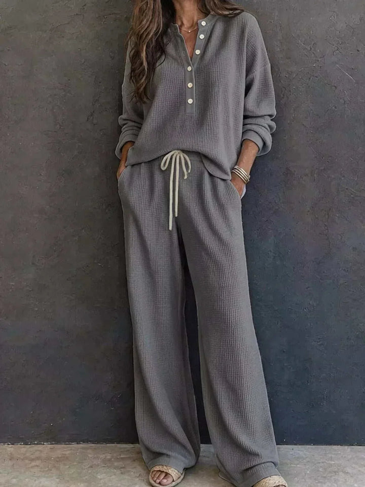 Women’s Waffle Knit Set in charcoal gray textured knit, with a button-front long-sleeve top and drawstring pants.