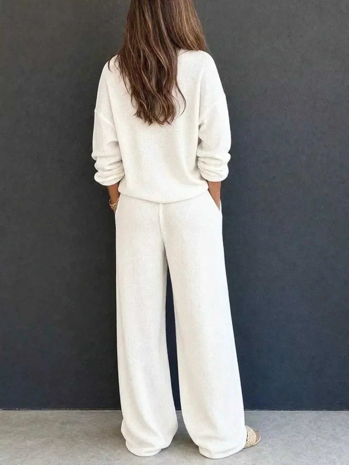 Women’s Waffle Knit Set in ivory with a textured long-sleeve top and relaxed wide-leg pants, shown from the back