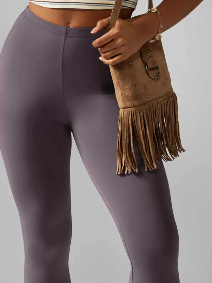 Women wearing high-waisted active capri leggings for casual and athletic wear