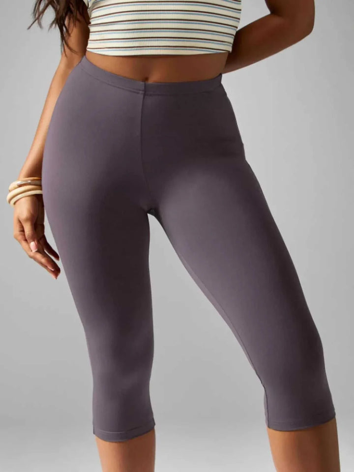 Woman wearing high-waisted active capri leggings for casual and light activity