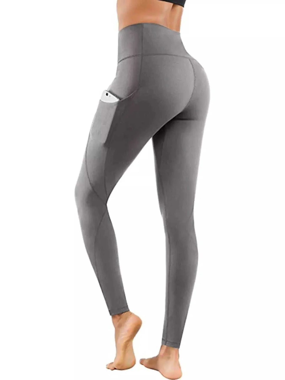 Women wearing high-waisted active leggings with pockets from Hot Topic Goods for casual and fitness use