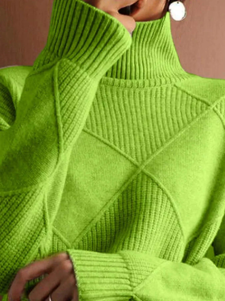 Women’s argyle turtleneck sweater with knit design featuring classic pattern and cozy long sleeves for fall and winter.
