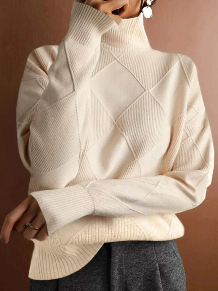 Woman wearing a Women’s Argyle Turtleneck Sweater with classic knit design and cozy long sleeves