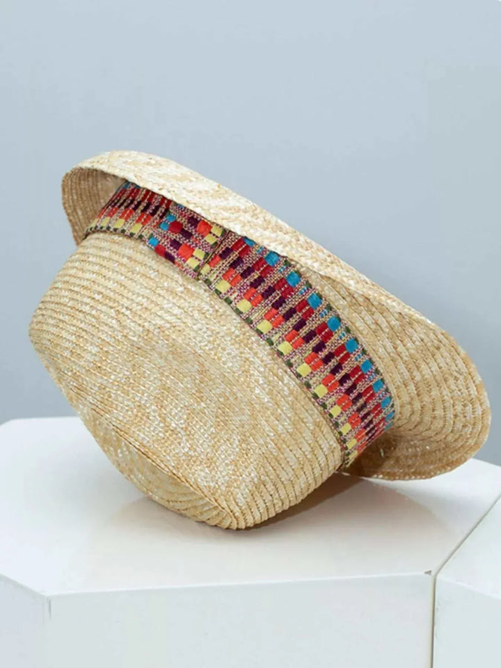 Women’s Bohemian Straw Sun Hat with woven straw design, perfect for summer and beachwear from Hot Topic Goods