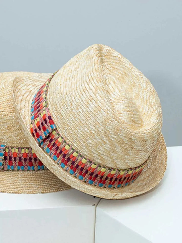Women’s Bohemian straw sun hat with woven design for summer beach and vacation style