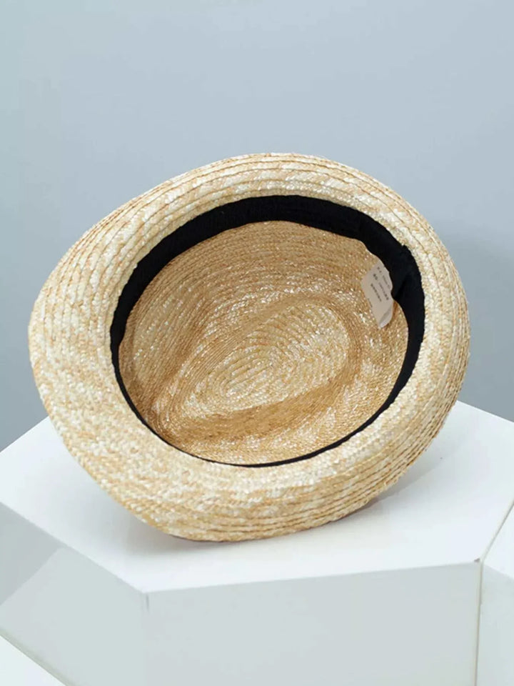 Women’s Bohemian Straw Sun Hat with relaxed boho design and lightweight straw weaving for summer outfits