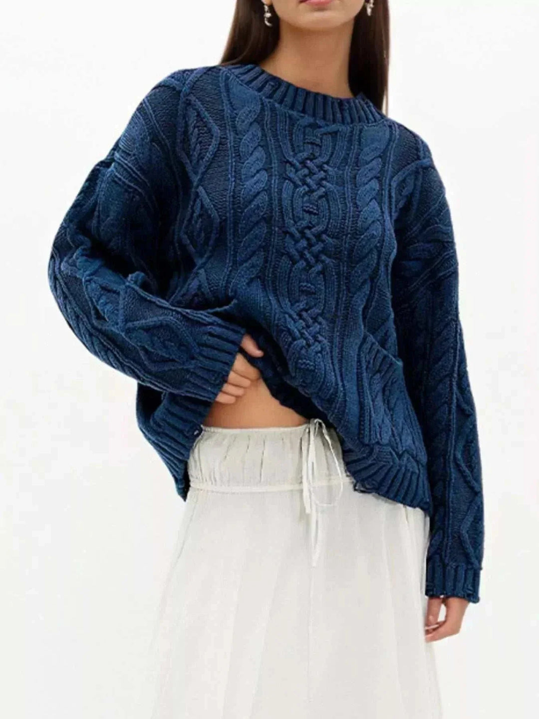 Women’s cable-knit pocket sweater with long sleeves and cozy textured design from Hot Topic Goods