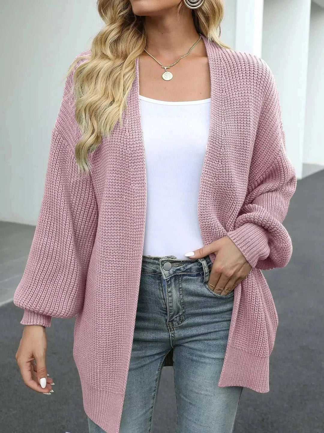 Women’s chunky knit cardigan with open-front design and long sleeves from Hot Topic Goods