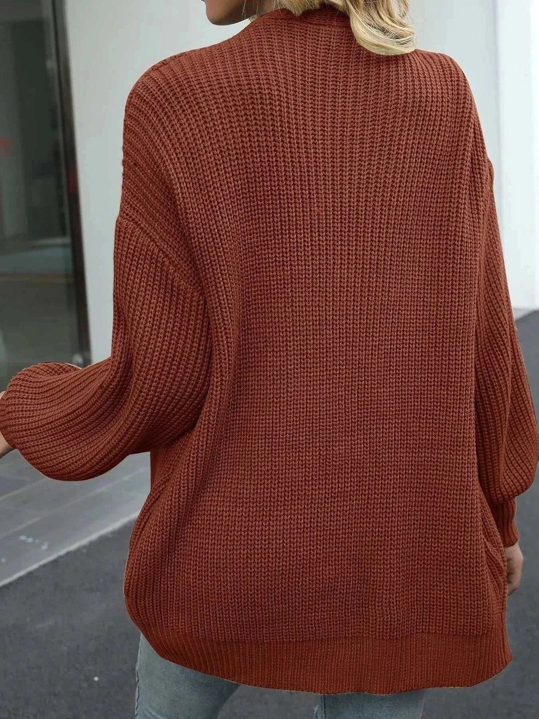 Women’s chunky knit cardigan with open-front design in beige highlighting cozy texture and relaxed fit