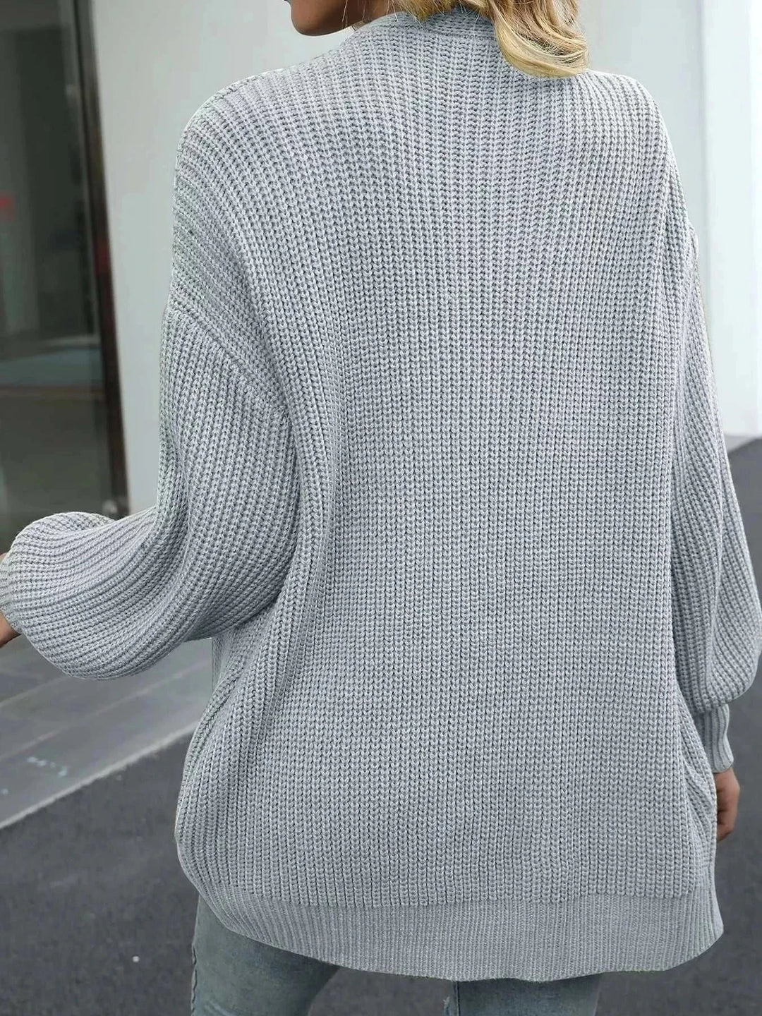 Women’s chunky knit cardigan with open-front design and long sleeves from Hot Topic Goods