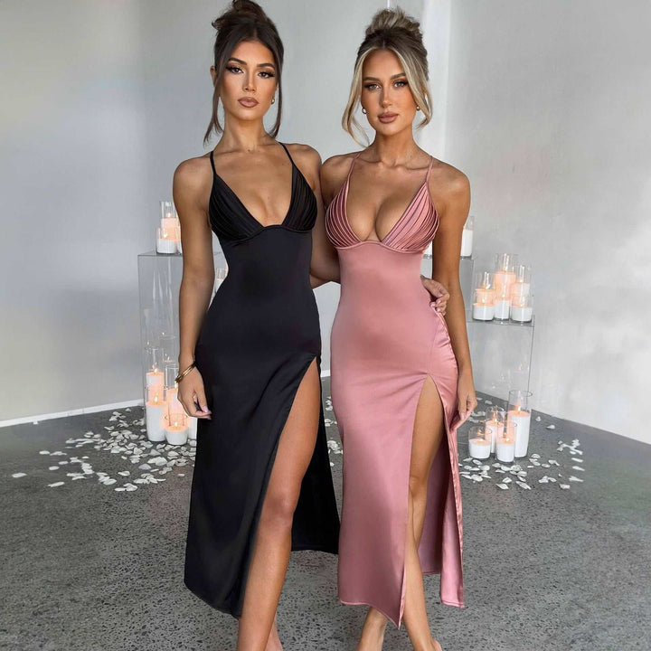 Woman wearing black deep V-neck backless bodycon dress with side split at evening event