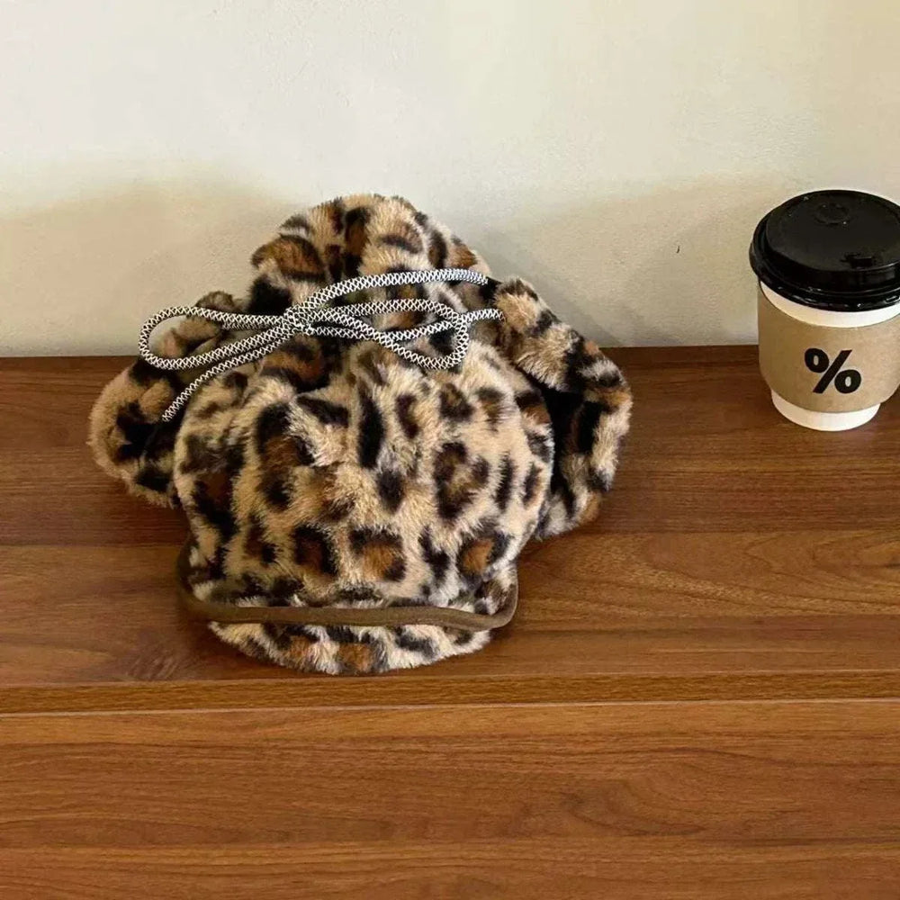 Women’s Faux Fur Trapper Hat with leopard print and faux fur texture from Hot Topic Goods