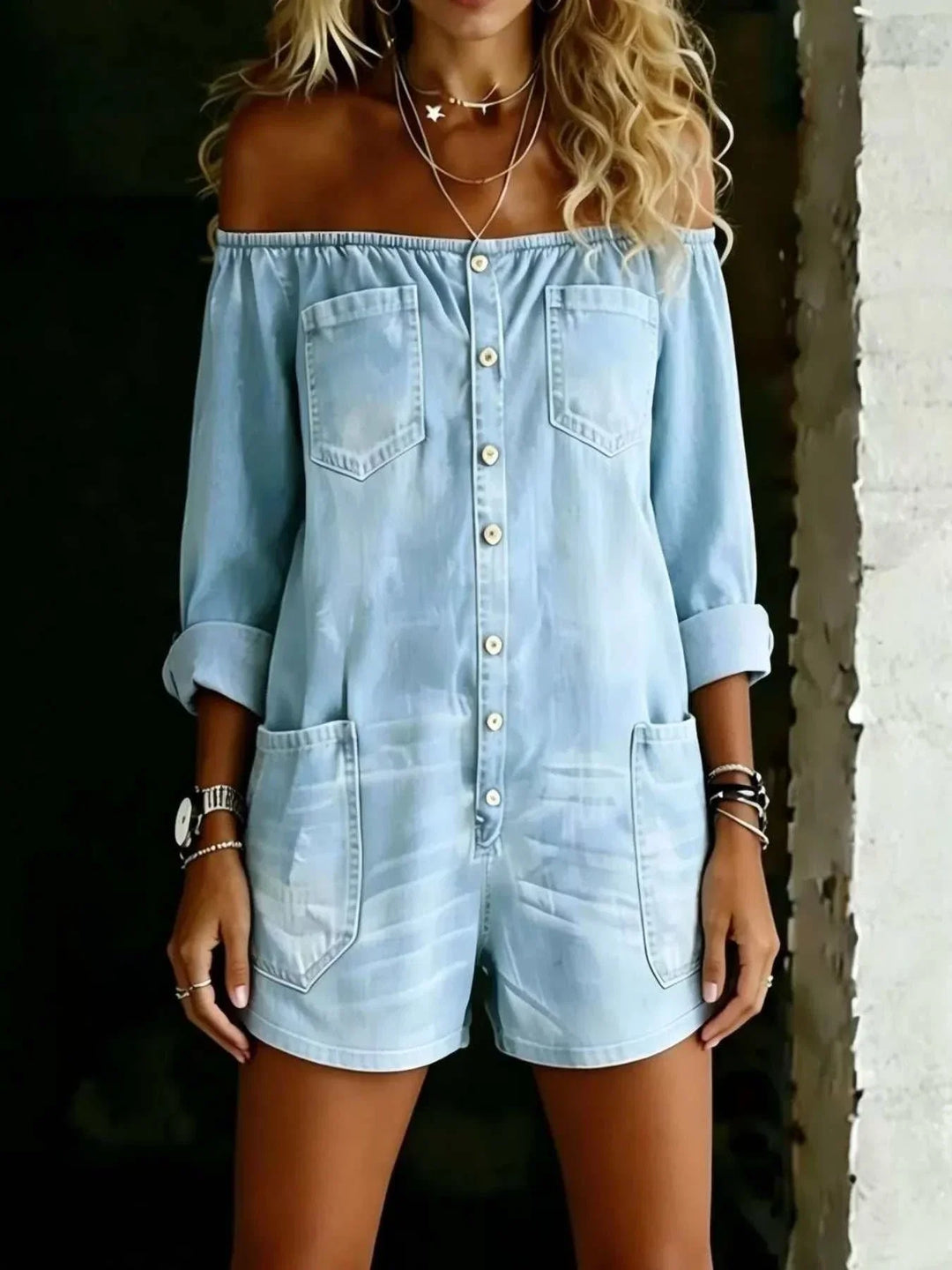 Woman wearing a full-size button-down off-shoulder romper from Hot Topic Goods