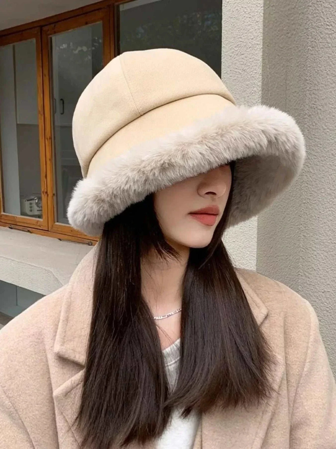 Women’s fuzzy trim bucket hat with cozy texture for fall and winter outfits