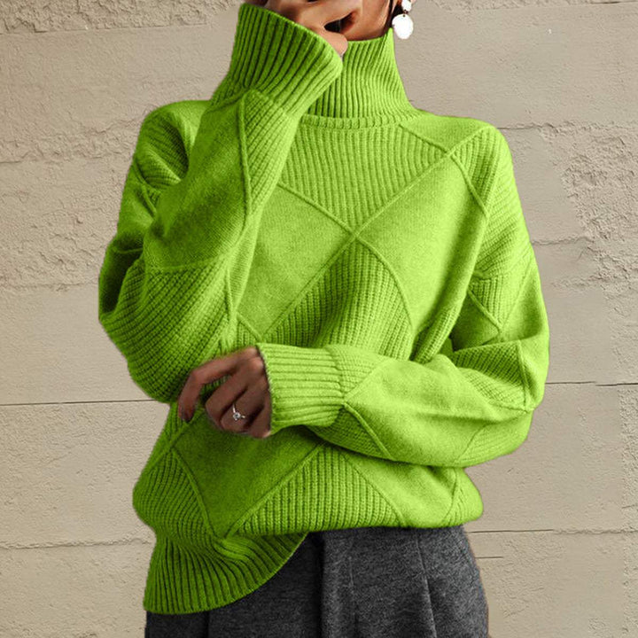 Women’s geometric turtleneck sweater with long sleeves in bold pattern from Hot Topic Goods