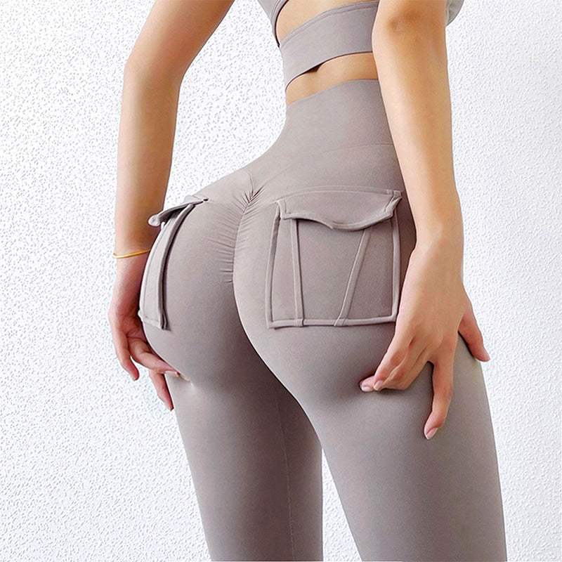 Women wearing high-waisted slim fit trousers from Hot Topic Goods in a stylish urban setting