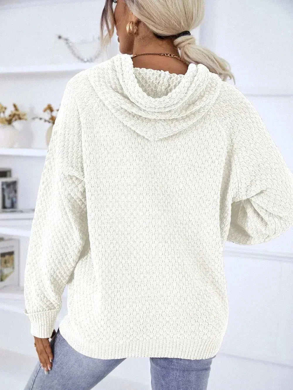 Women wearing textured knit hooded drawstring sweater from Hot Topic Goods