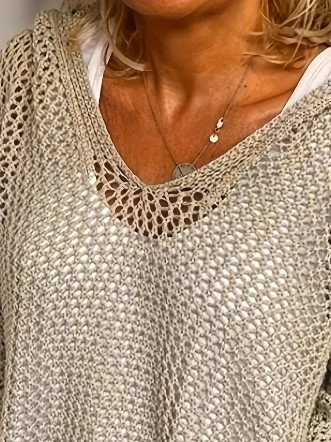Women’s Hooded Knit Cover-Up with openwork knit, long sleeves, and hood, styled over swimwear for beach and resort wear