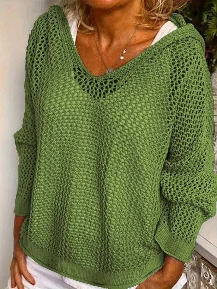 Woman wearing lightweight Women’s Hooded Knit Cover-Up with hood and long sleeves on beach
