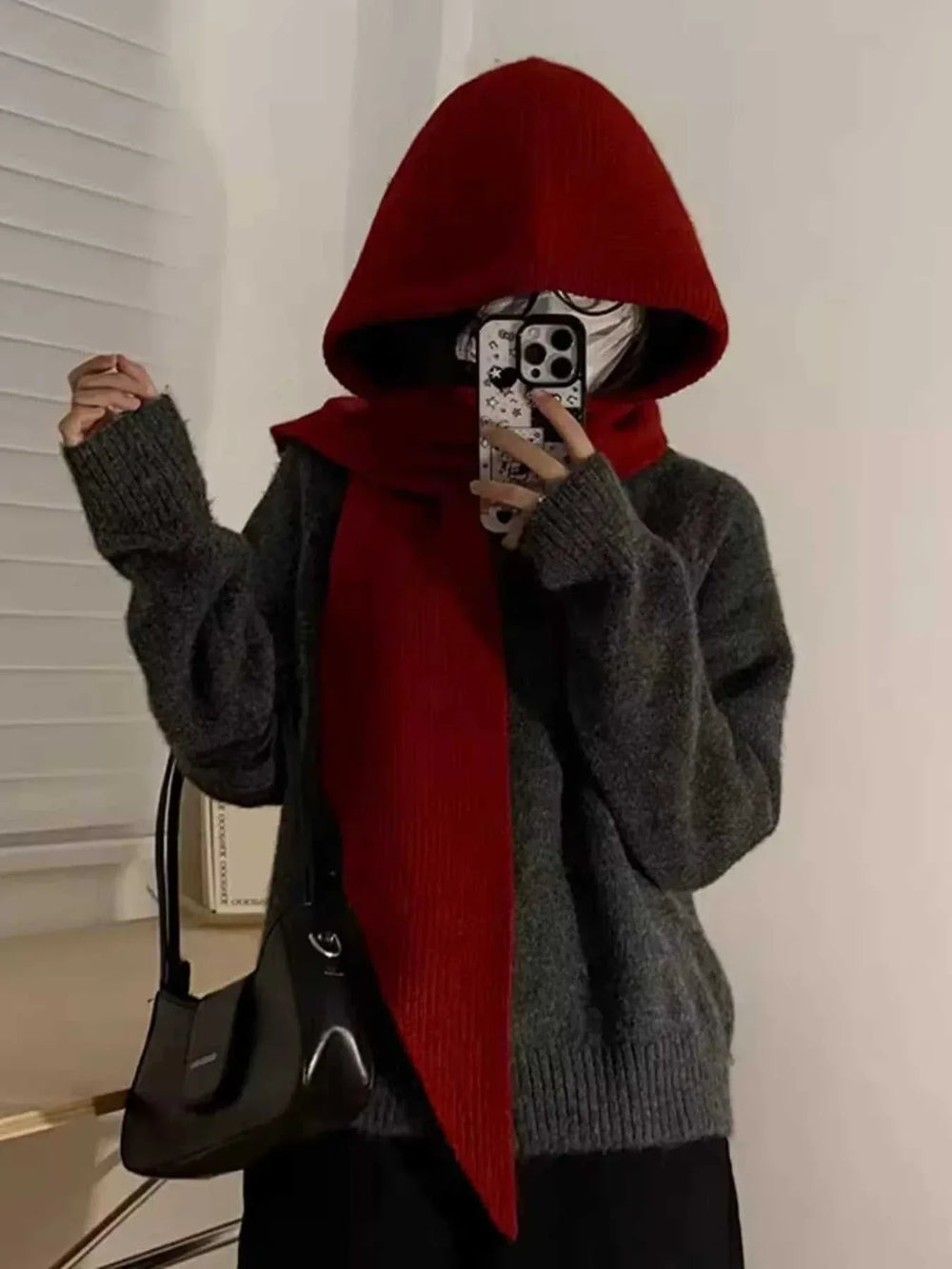 Women’s knitted hat with attached scarf in cozy polyester blend for cold weather from Hot Topic Goods