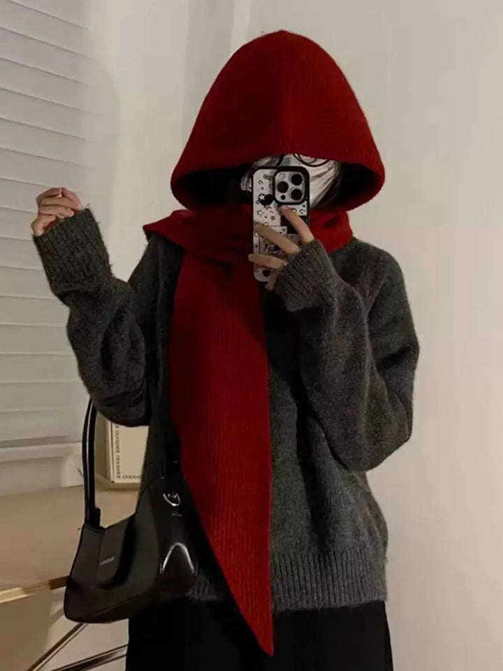 Women’s knitted hat with attached scarf in cozy polyester blend for cold weather from Hot Topic Goods
