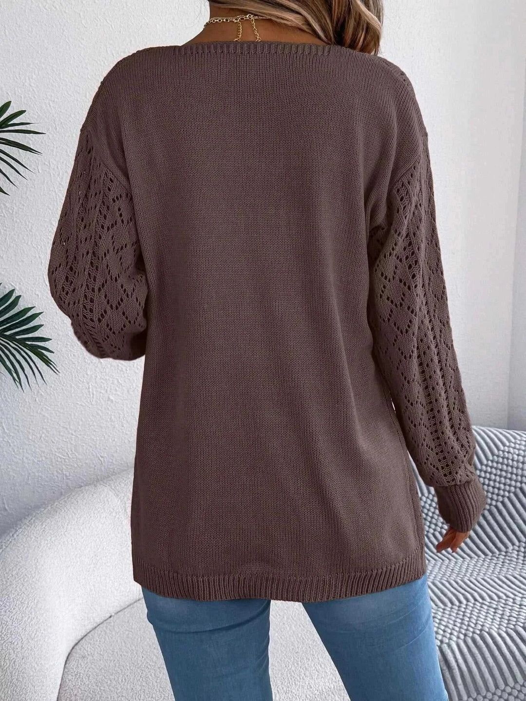 Women’s lightweight open-front cardigan with openwork design and long sleeves from Hot Topic Goods