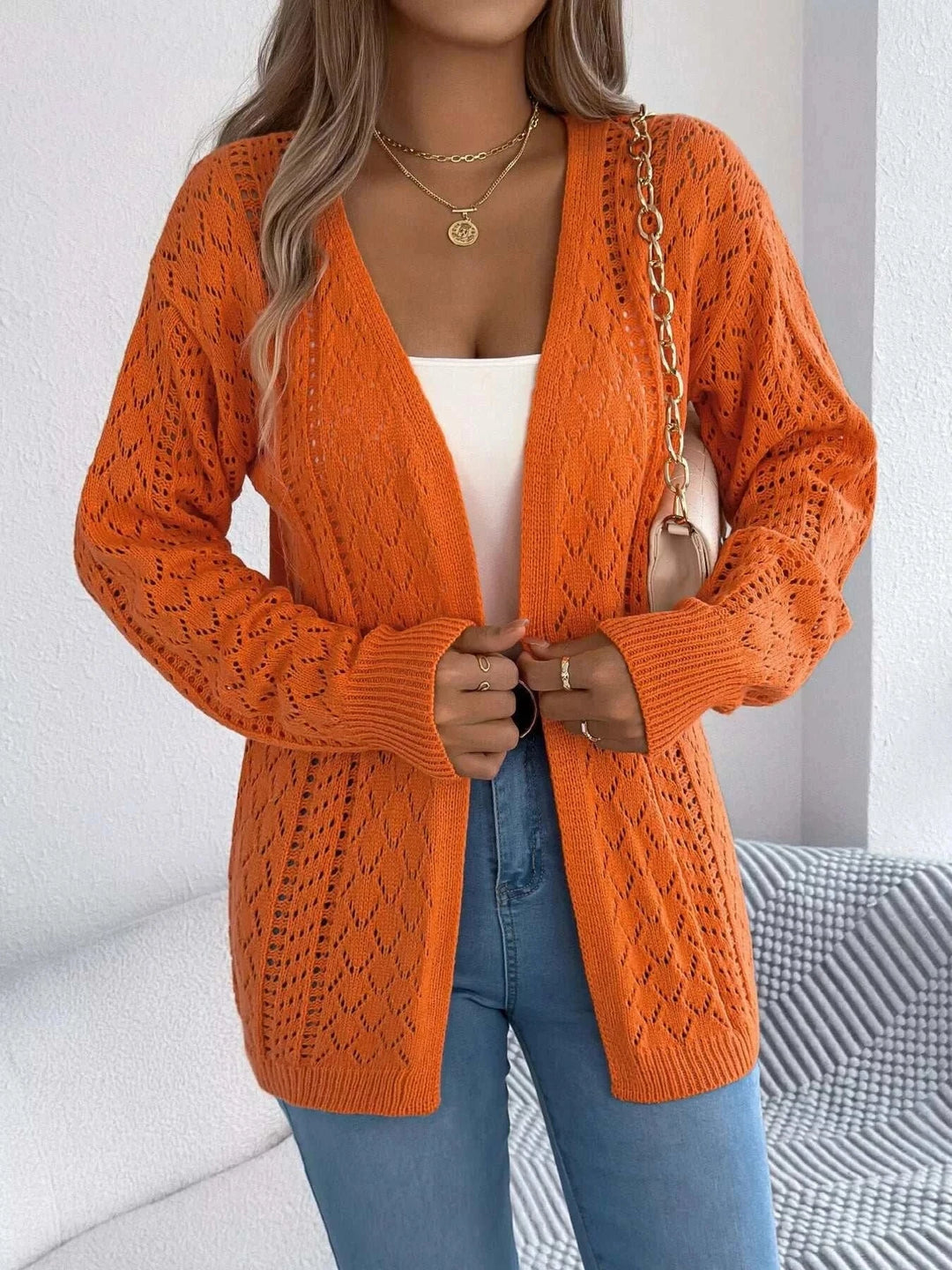 Women’s Lightweight Open-Front Cardigan with openwork design and long sleeves from Hot Topic Goods