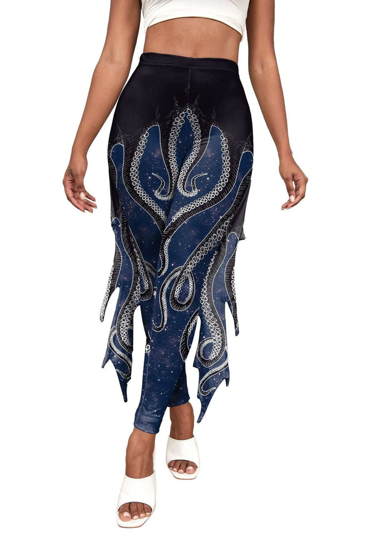 Women wearing vibrant mermaid print leggings from Hot Topic Goods showcasing fitted, fantasy-inspired activewear design
