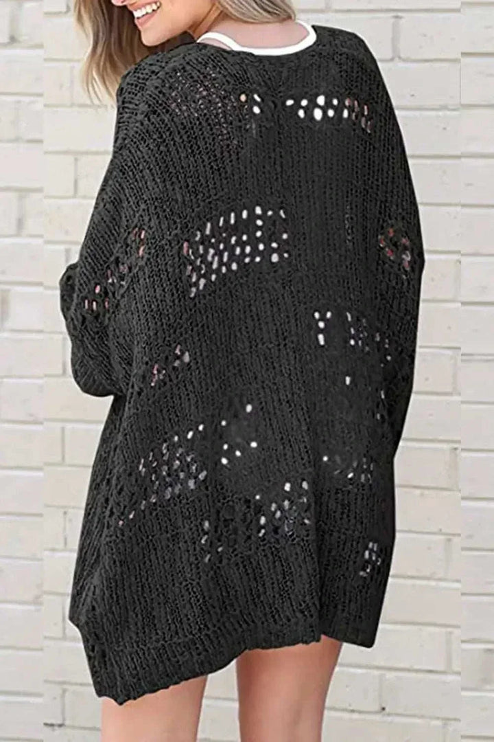 Women wearing a lightweight open-front long sleeve cardigan with textured openwork design from Hot Topic Goods