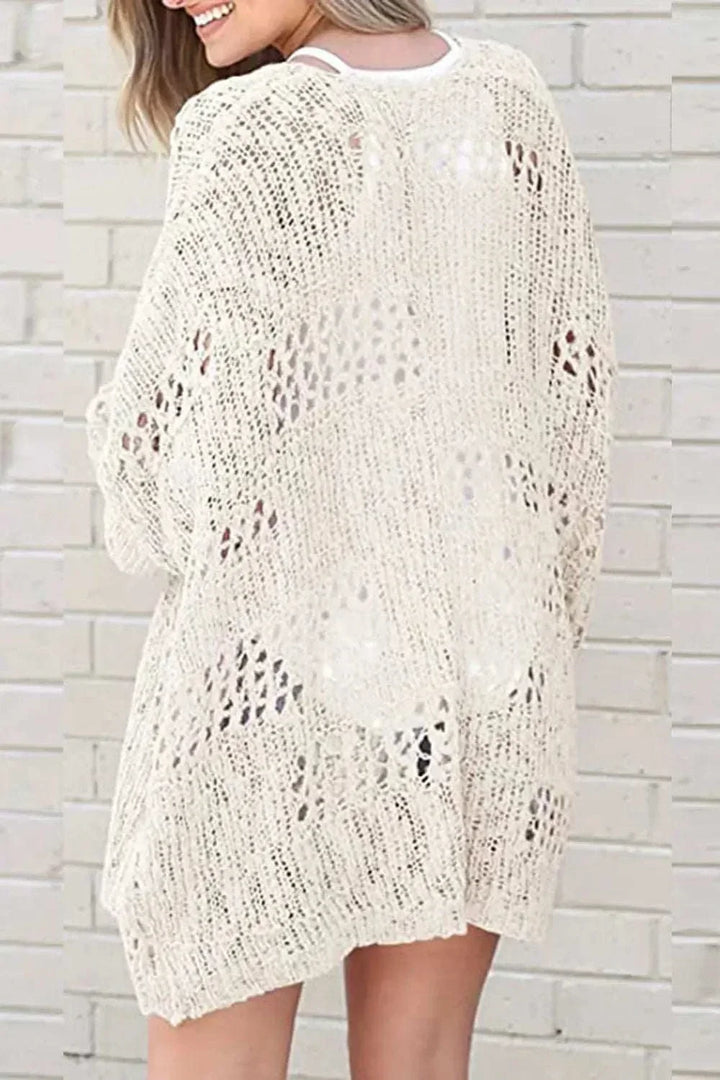 Women wearing open-front long sleeve cardigan with lightweight textured design from Hot Topic Goods