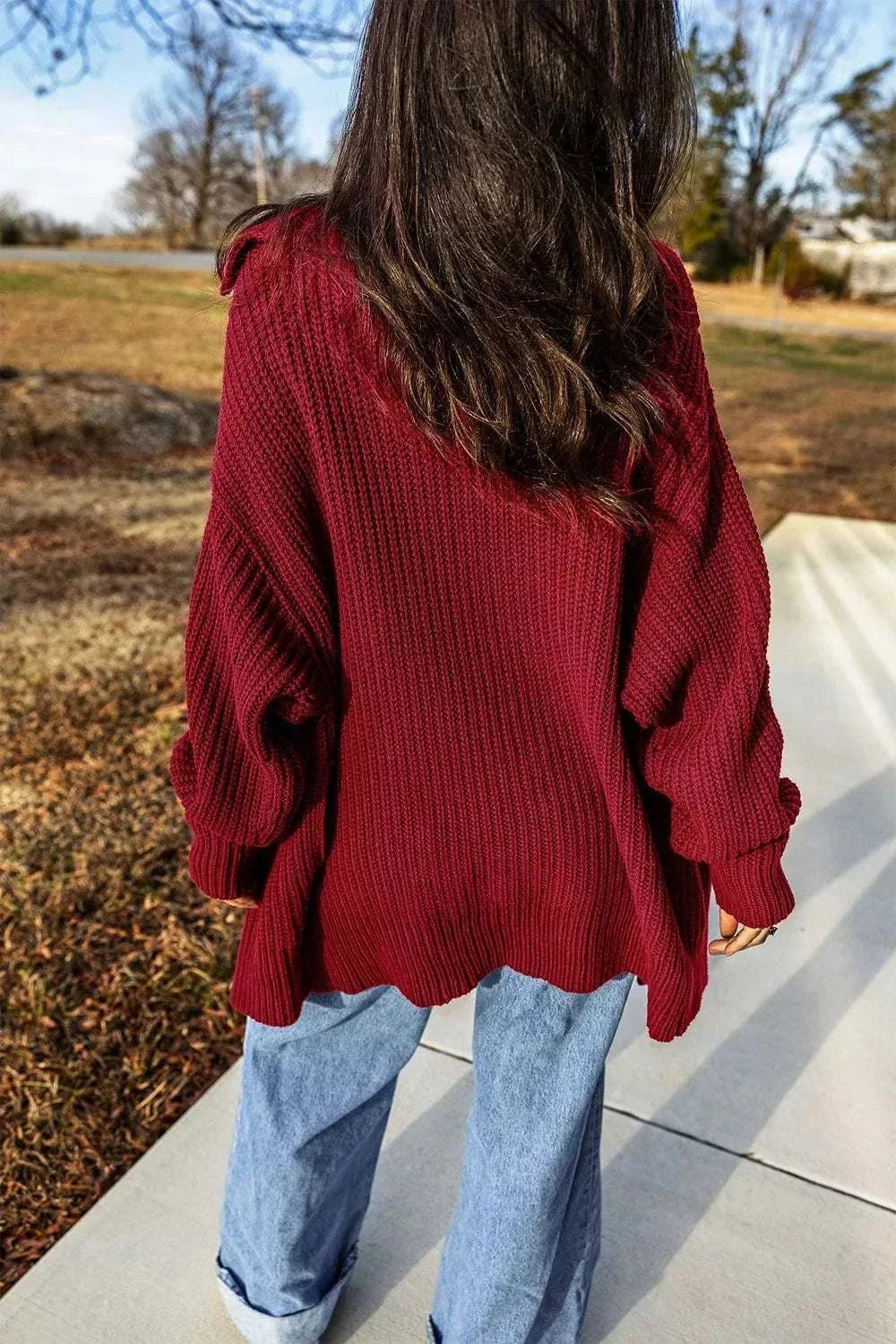 Women wearing Women’s Oversized Knit Cardigan by Hot Topic Goods, button-front, long sleeves, casual fall layering