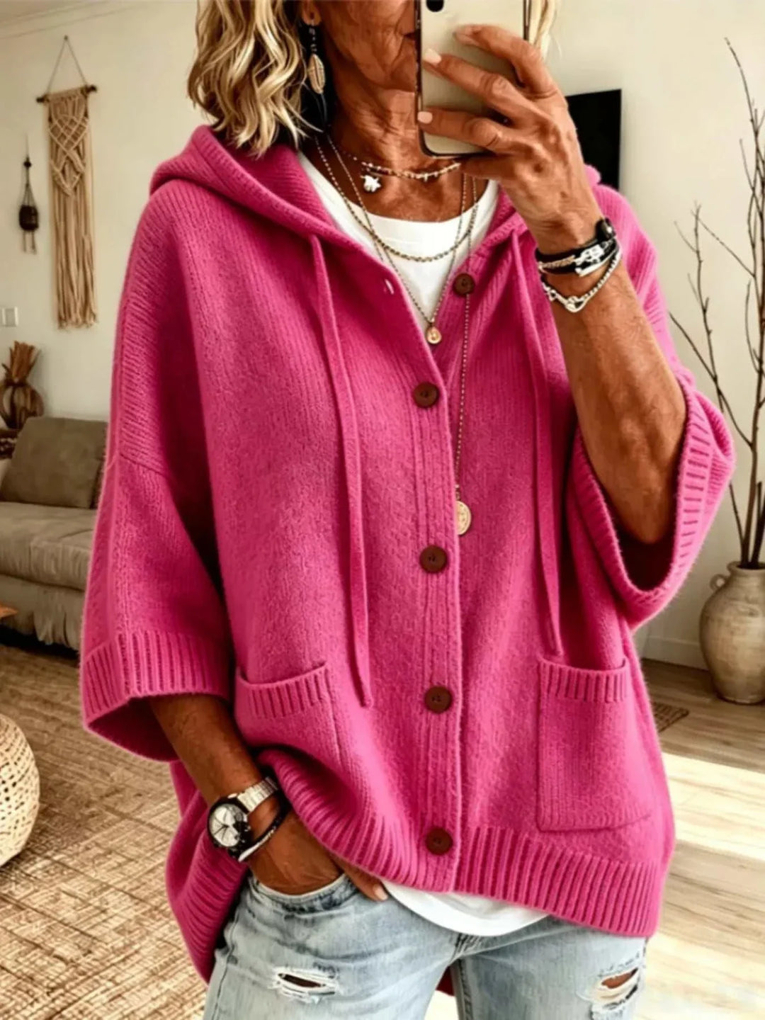 Women’s plus size hooded knit cardigan with button front and pockets from Hot Topic Goods