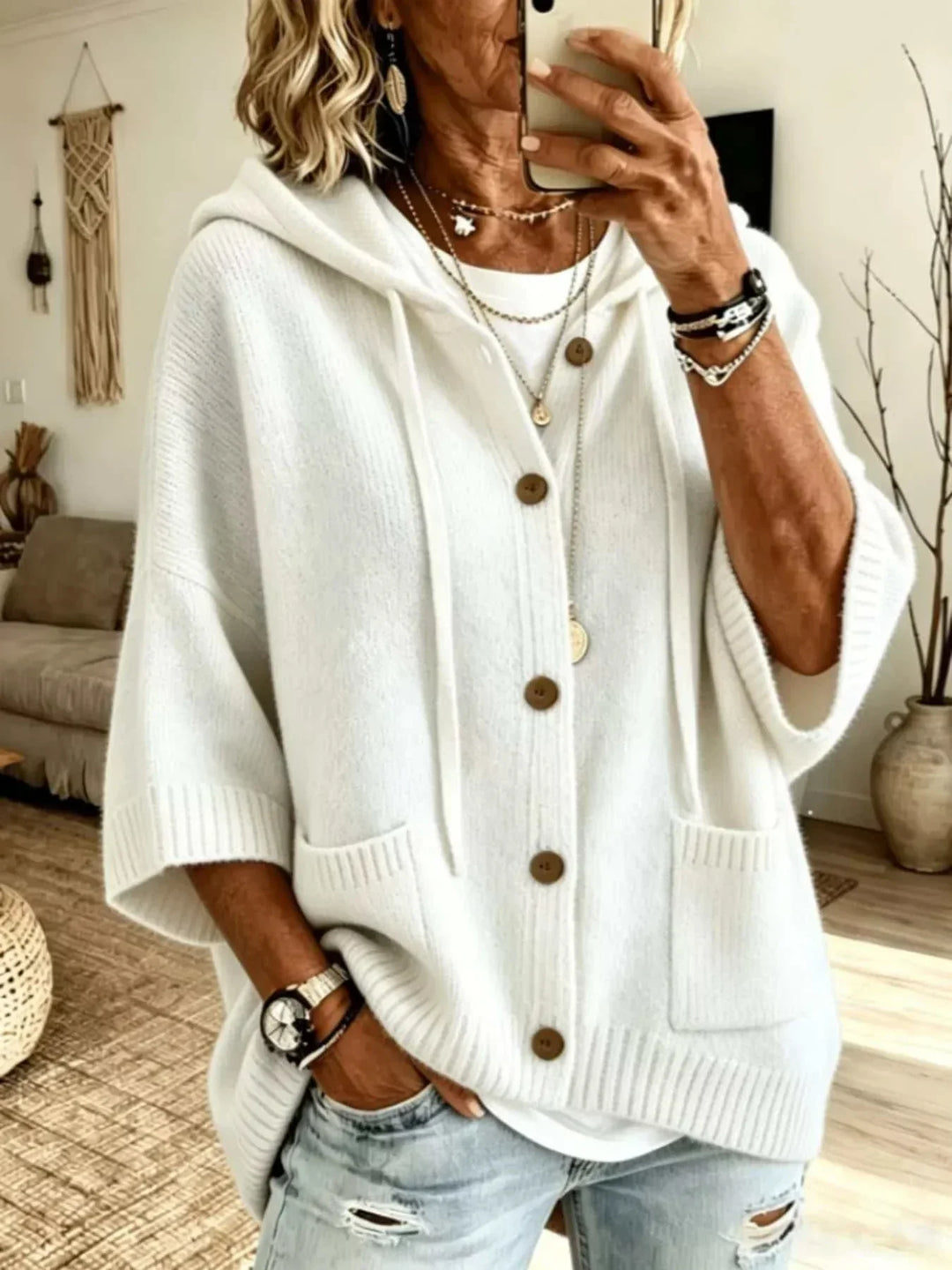 Women's plus size hooded knit cardigan with button front and pockets from Hot Topic Goods