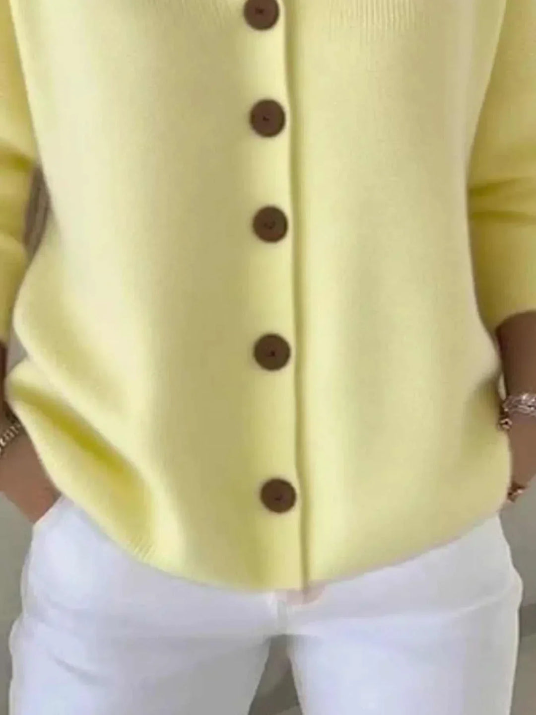 Women’s plus size long sleeve hooded cardigan with button front from Hot Topic Goods in soft knit fabric