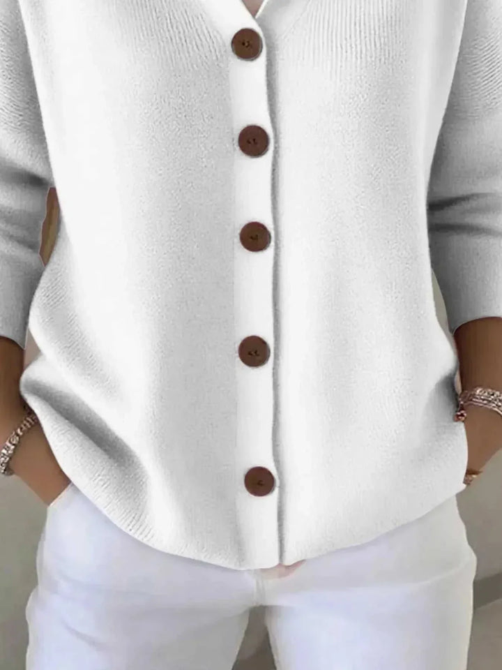 Women’s plus size long sleeve hooded cardigan with button front from Hot Topic Goods