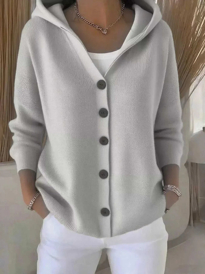 Women’s plus size long sleeve cardigan with button front and hood from Hot Topic Goods in soft knit fabric