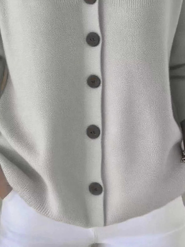 Women’s plus size long sleeve button-front cardigan with hood from Hot Topic Goods in soft knit fabric