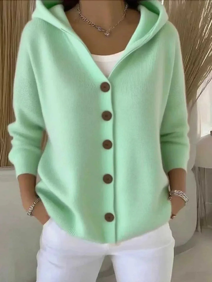Women’s Plus Size Long Sleeve Cardigan with button front and hood from Hot Topic Goods, soft knit, casual cool-weather layering.