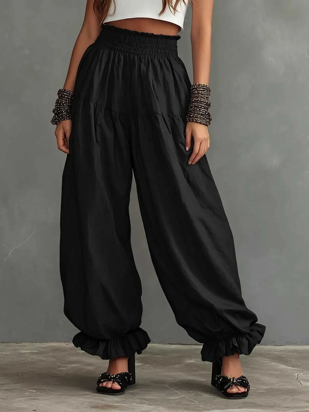Women’s plus size wide-leg pants with smocked waist and ruffle hem from Hot Topic Goods