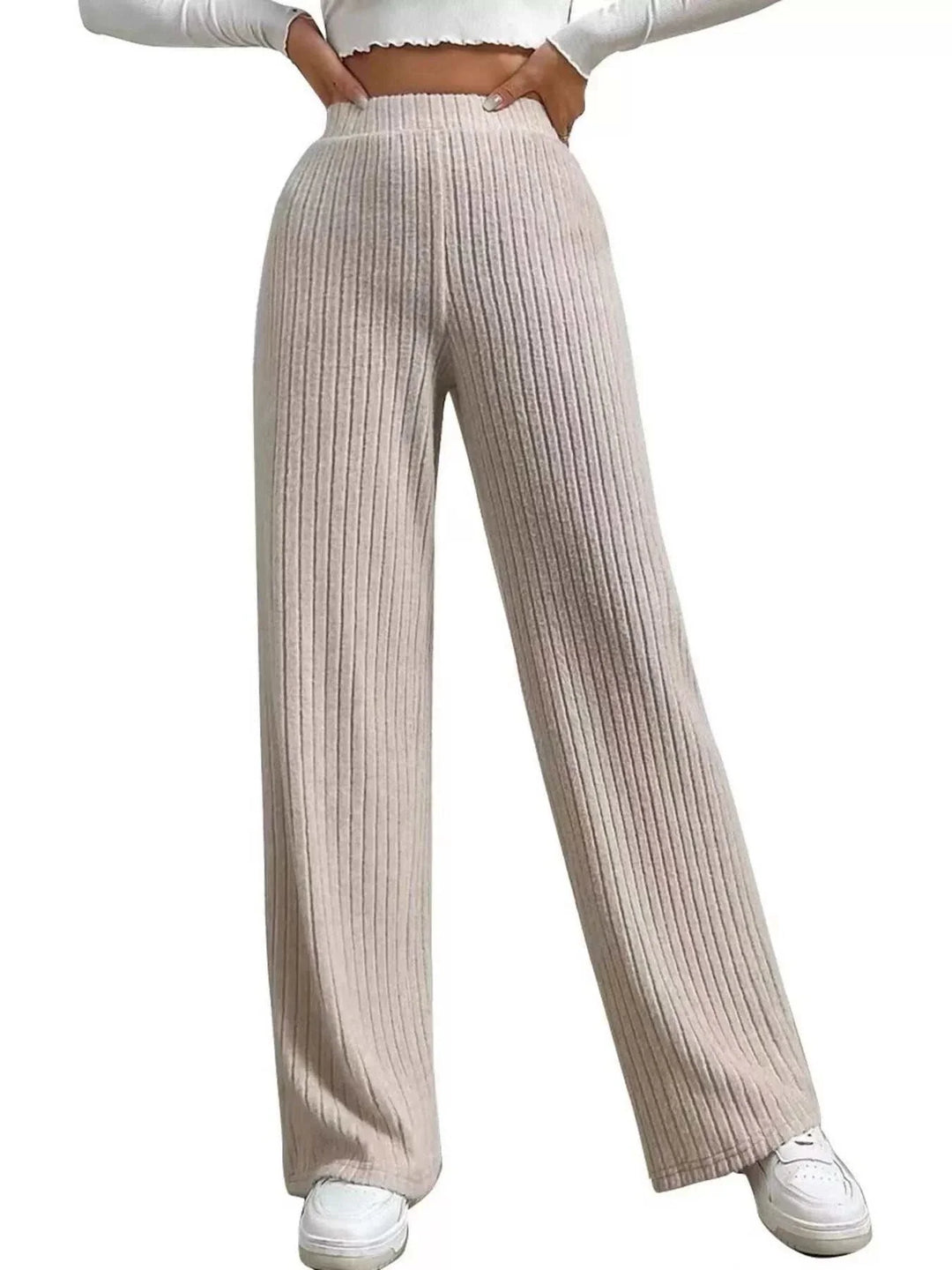 Woman wearing Women's Ribbed Knit Pants with relaxed wide-leg and ribbed texture from Hot Topic Goods