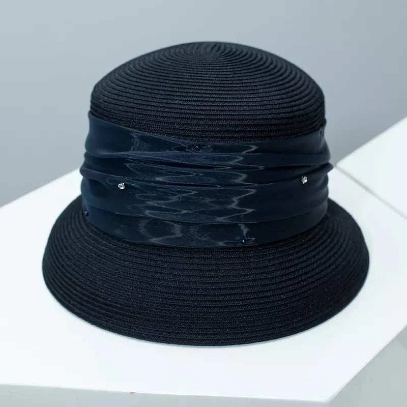 Women's Ribbon Detail Hat in wheat straw with elegant ribbon accent from Hot Topic Goods