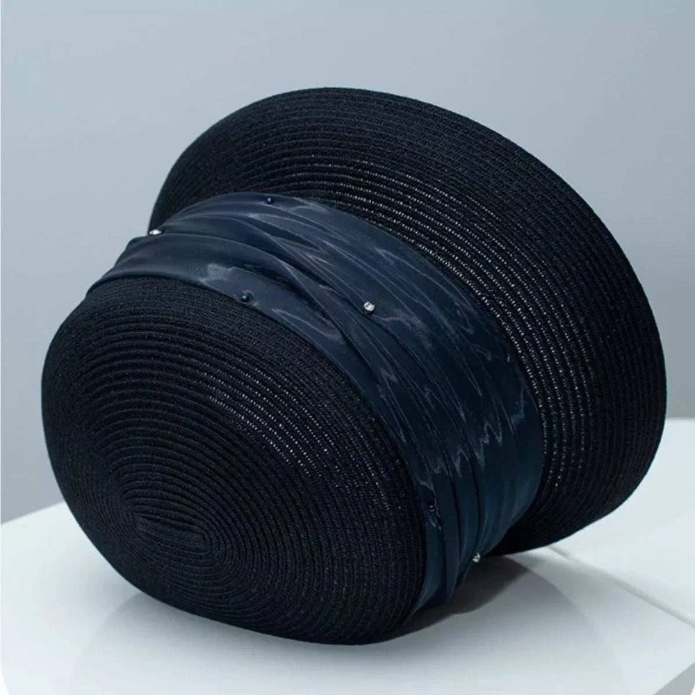 Women's ribbon detail hat in wheat straw with elegant ribbon accent from Hot Topic Goods